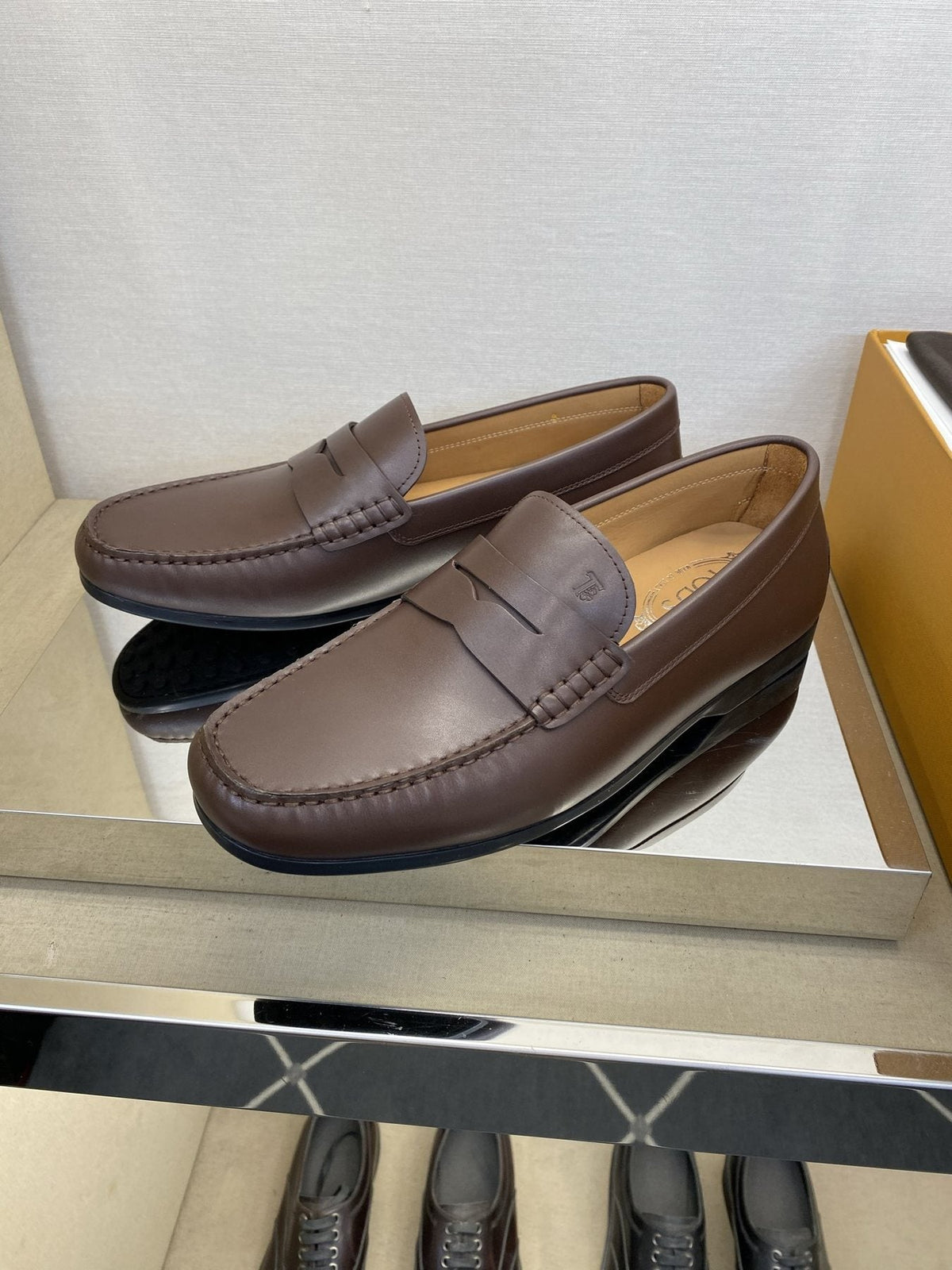 Tod's Textured Penny Loafers — side