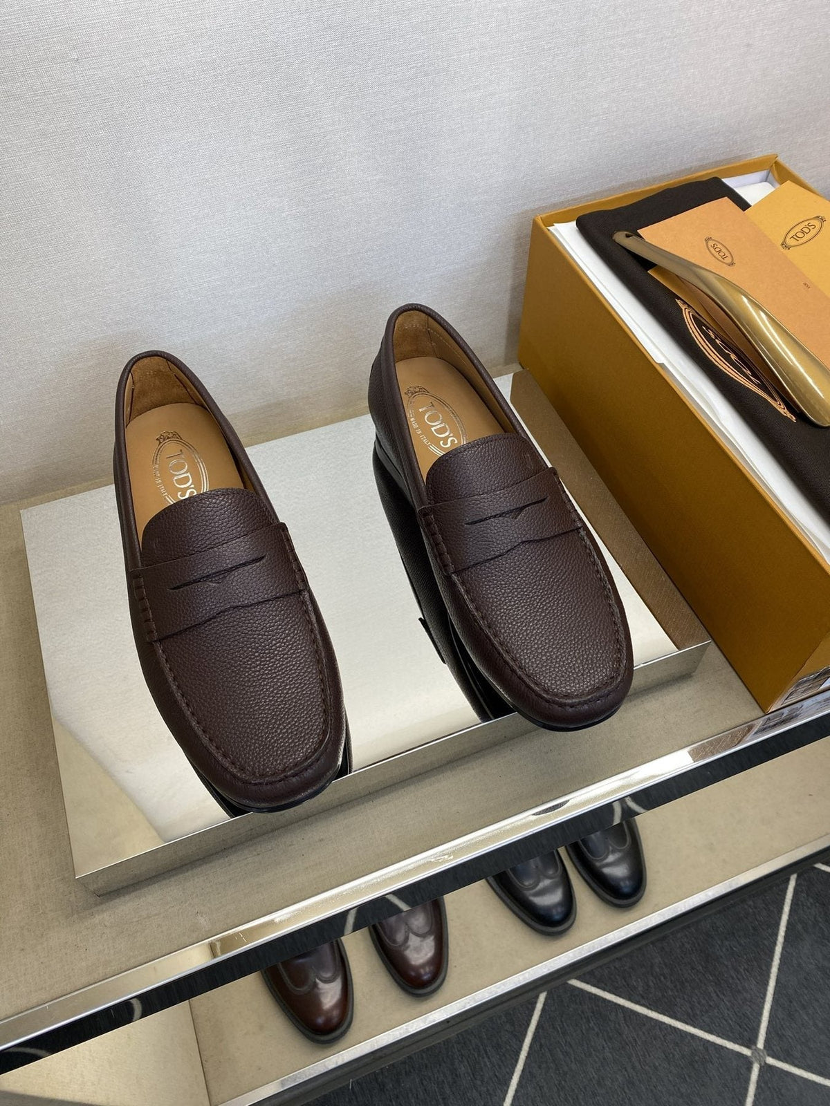 Tod's Textured Penny Loafers — front