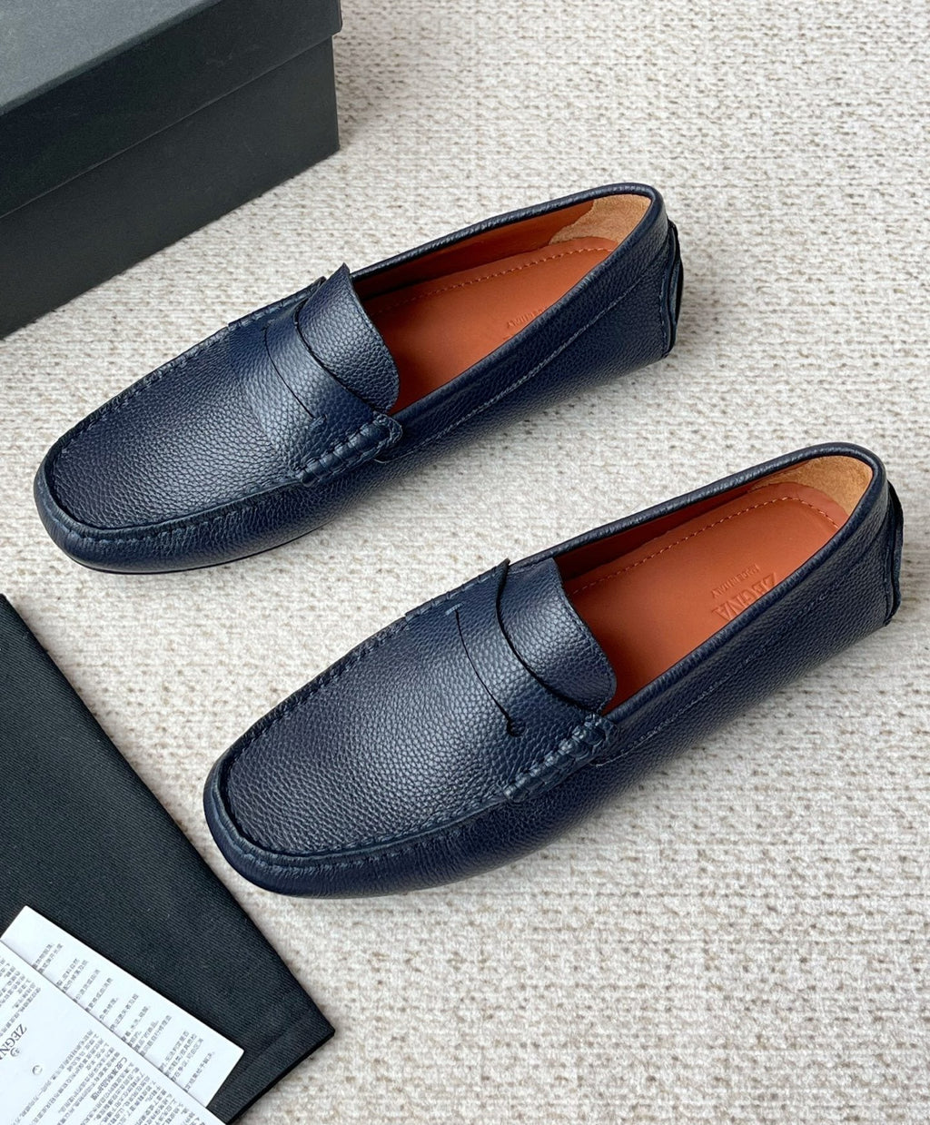 Zegna Pebbled Leather Penny Loafers — front