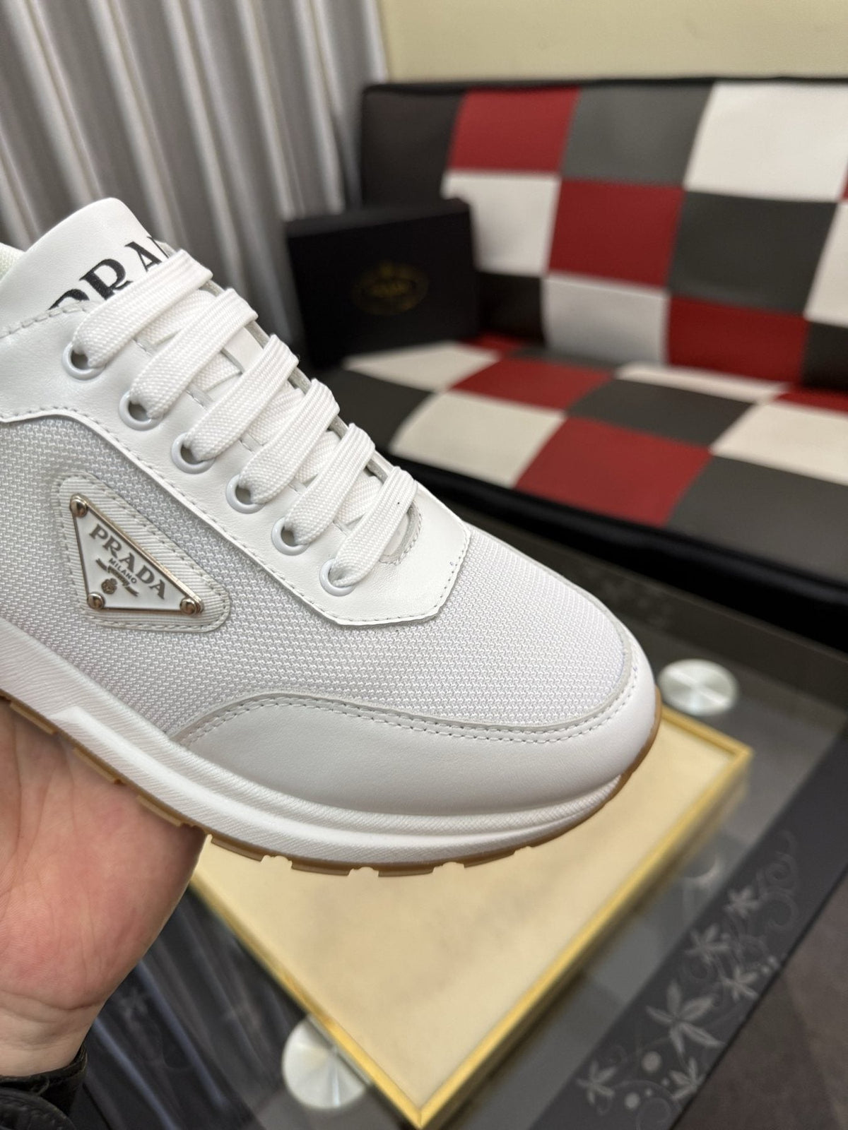 Prada Triangle Plaque Low-Top Sneakers — detail