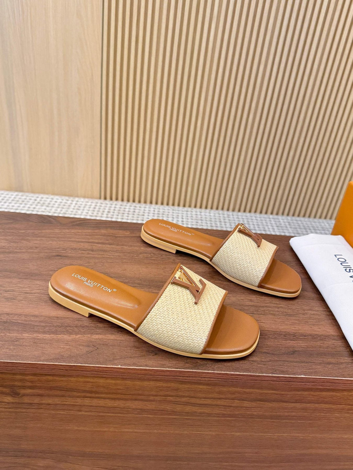 Louis Vuitton Textured Logo Slide Sandals — side