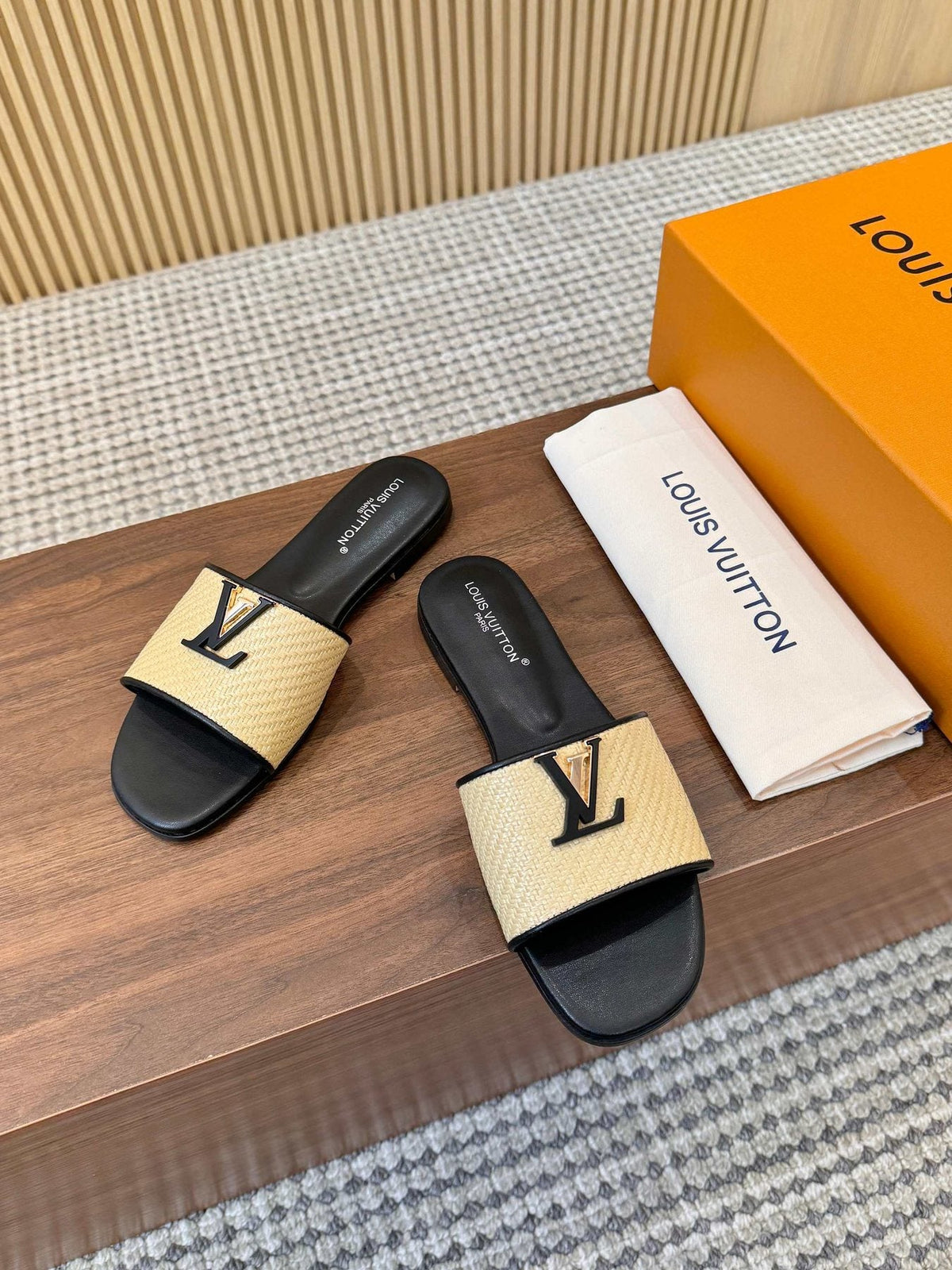 Louis Vuitton Textured Logo Slide Sandals — front