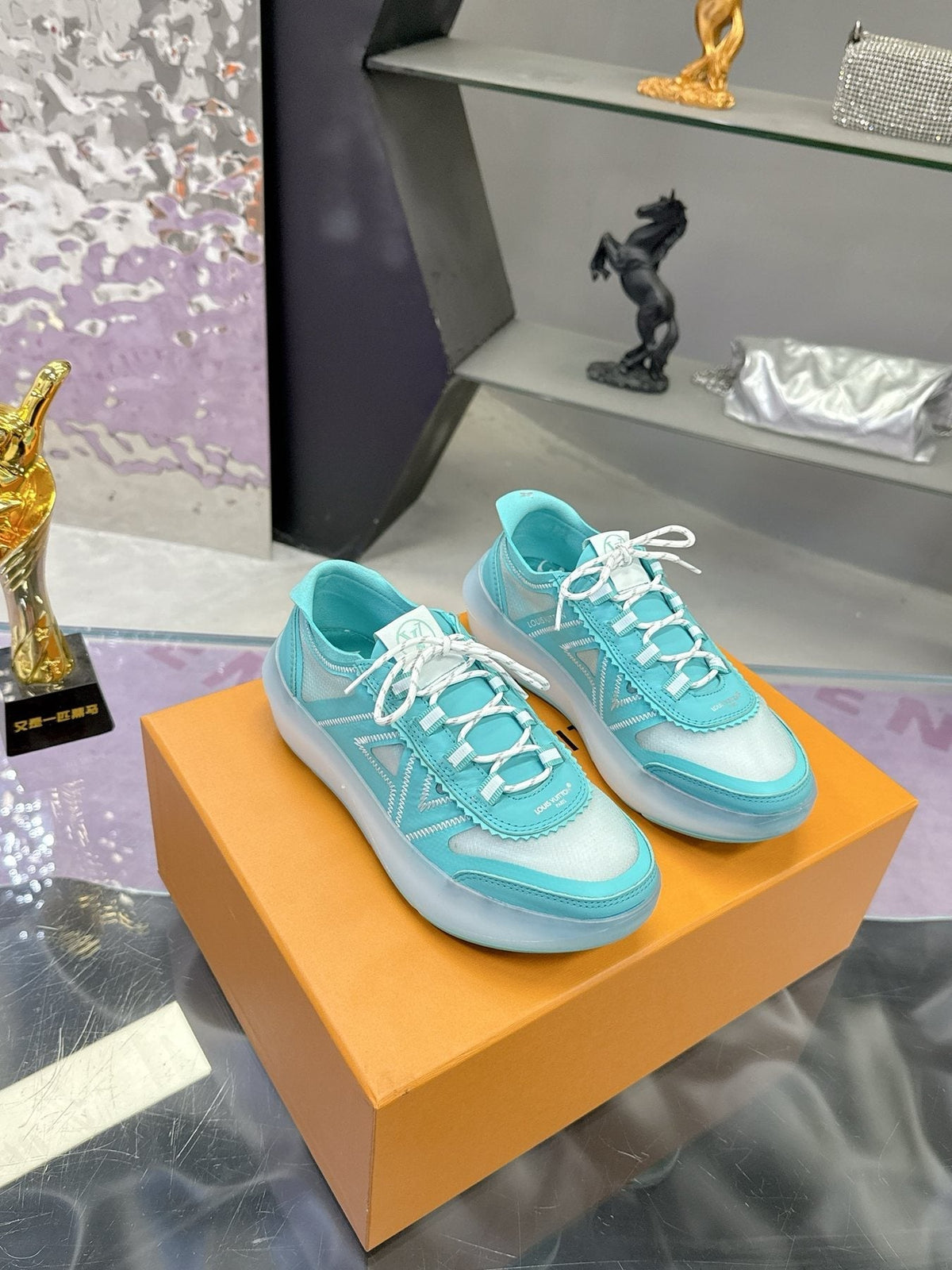 Louis Vuitton Aqua Blue and White Low-Top Sneakers — front