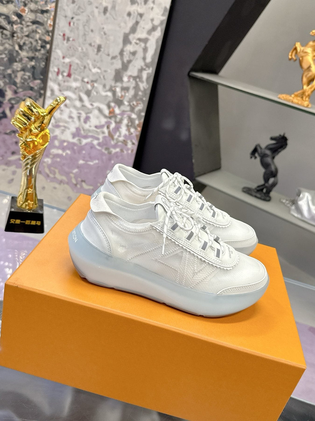 Louis Vuitton Aqua Blue and White Low-Top Sneakers — front