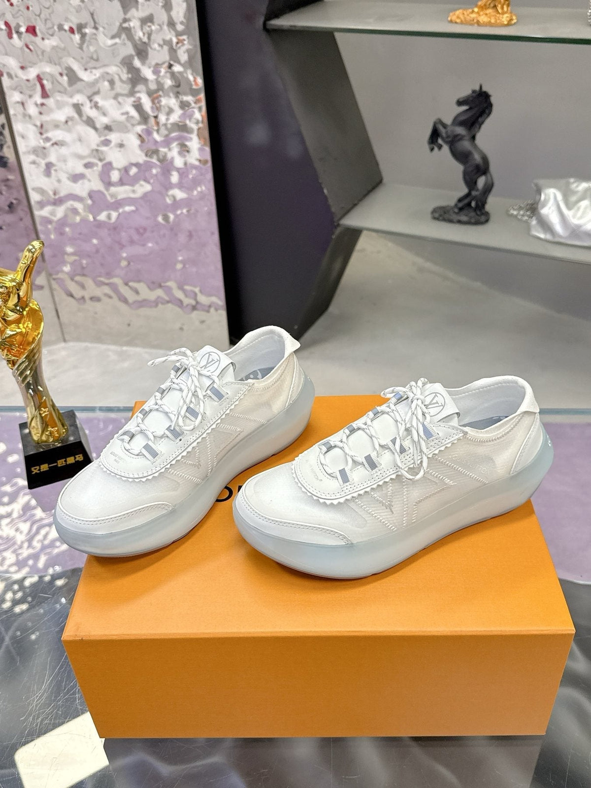 Louis Vuitton Aqua Blue and White Low-Top Sneakers — front