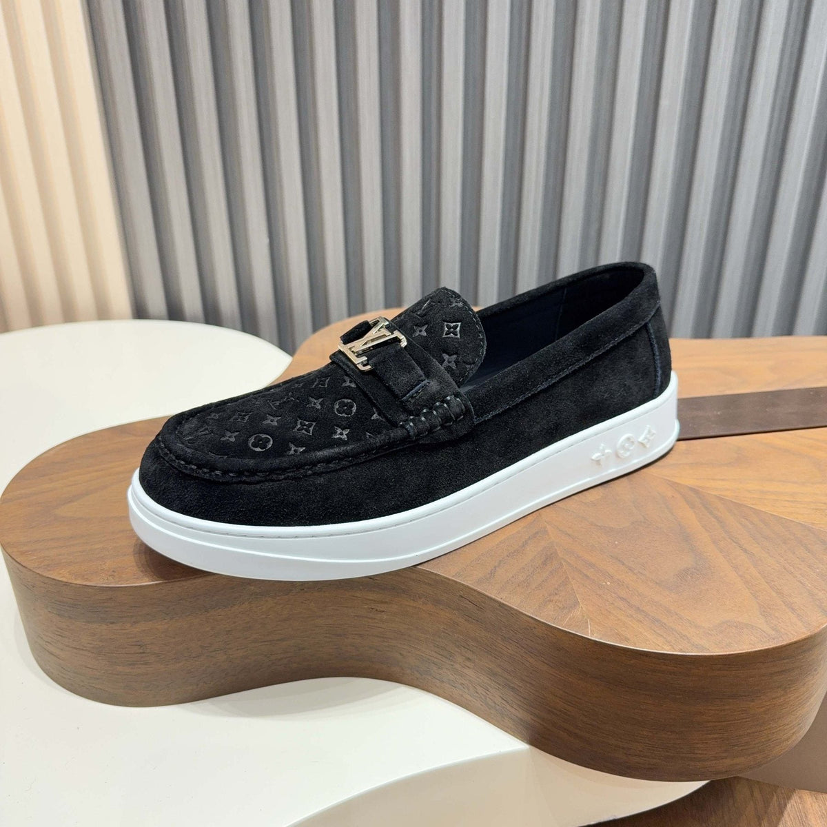 Louis Vuitton Embossed Slip-On Sneakers — side