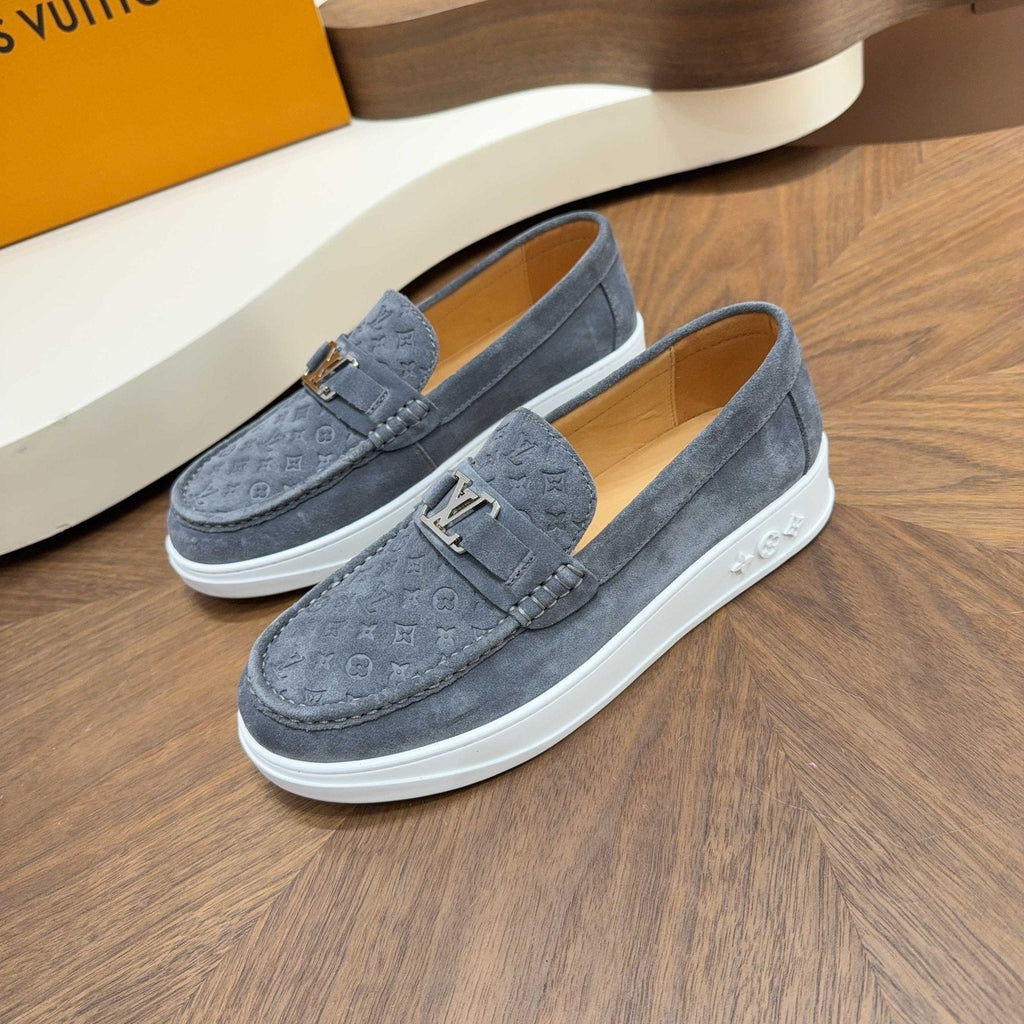 Louis Vuitton Embossed Slip-On Sneakers — front