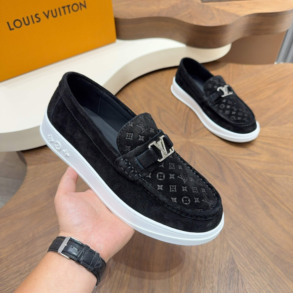 Louis Vuitton Embossed Slip-On Sneakers — model