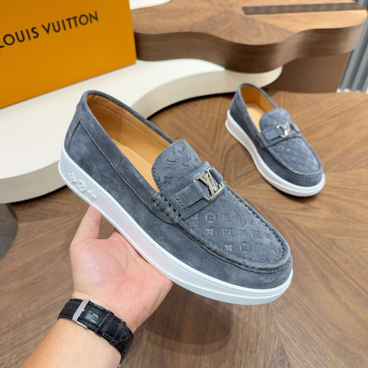 Louis Vuitton Embossed Slip-On Sneakers — model