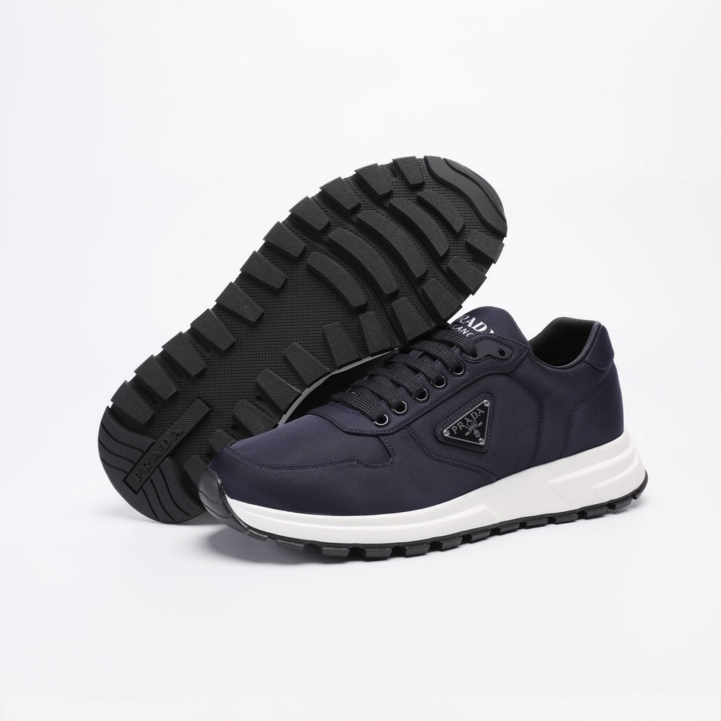 PRADA Navy Triangle Badge Sneakers — side