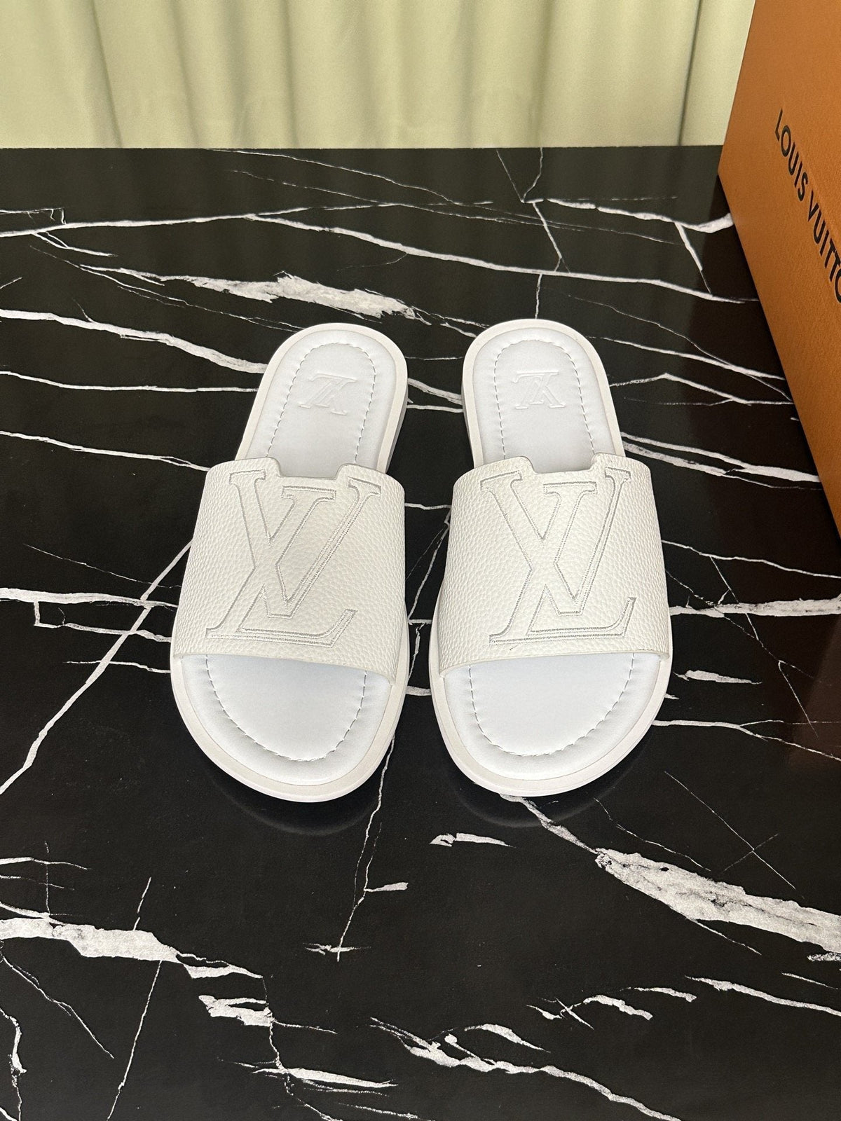 Louis Vuitton Lettered Strap Slide Sandals — hero