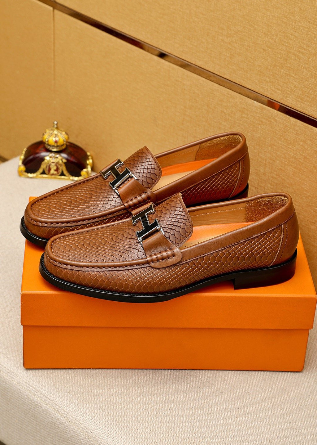 Hermès Textured Hardware Loafers — front
