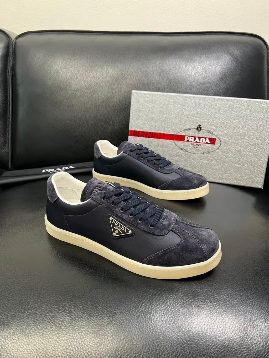 Prada Triangle Logo Low-Top Sneakers — front