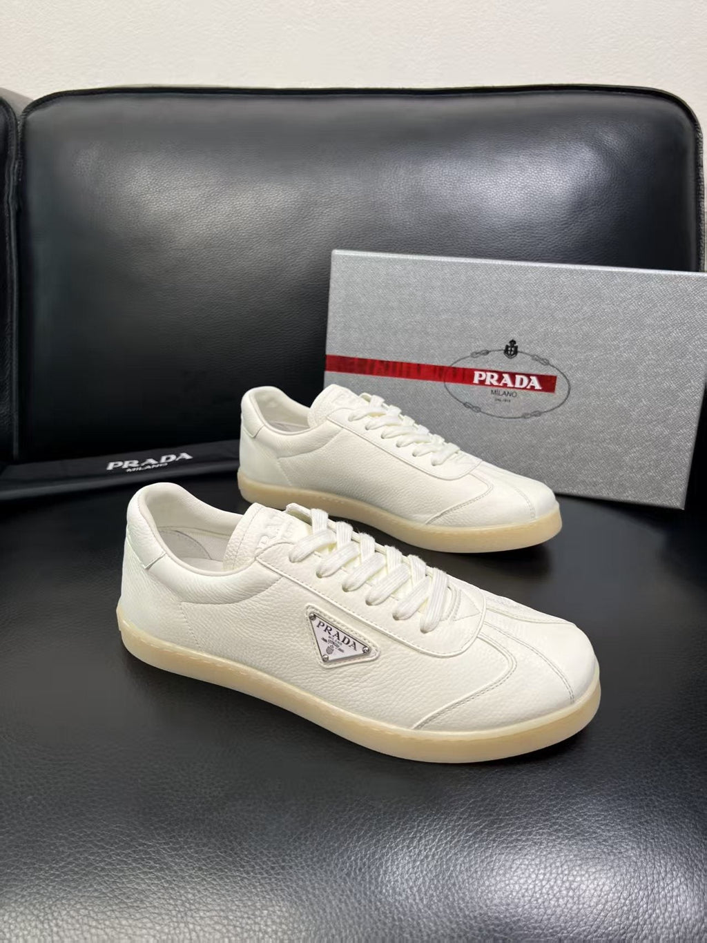 Prada Triangle Logo Low-Top Sneakers — front