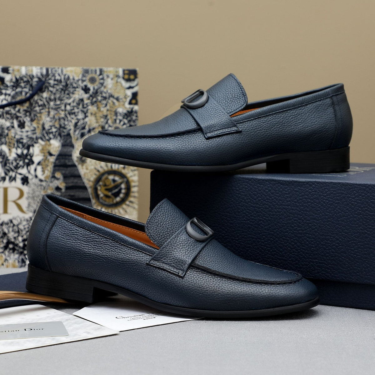 Dior Pebbled Leather Hardware Loafers — front