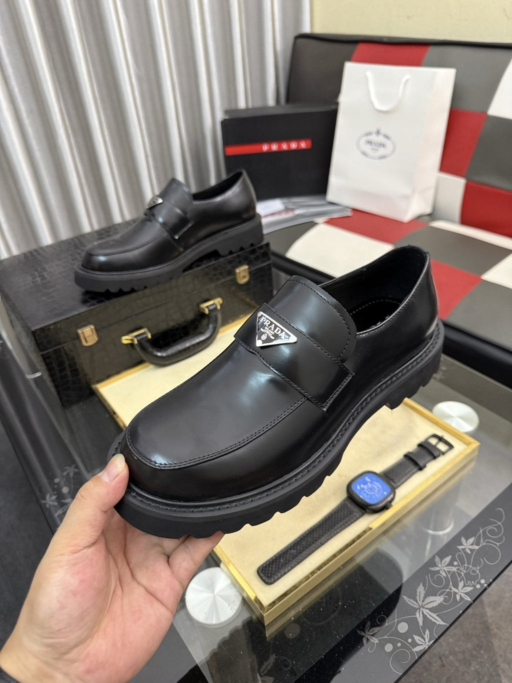 Prada Black Plaque Strap Loafers — model