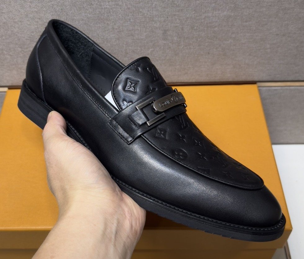 Louis Vuitton Embossed Metal-Bar Loafers — front