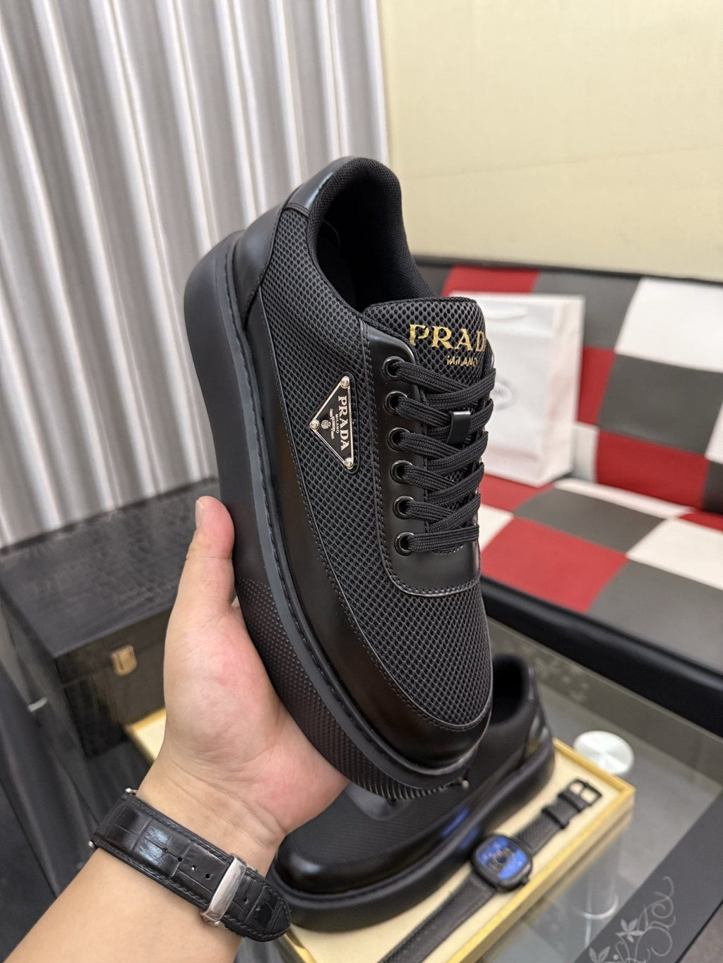 Prada Triangle Badge Low-Top Sneakers — model