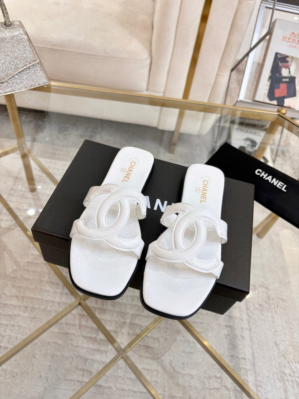 Chanel Embossed Logo Slide Sandals — front