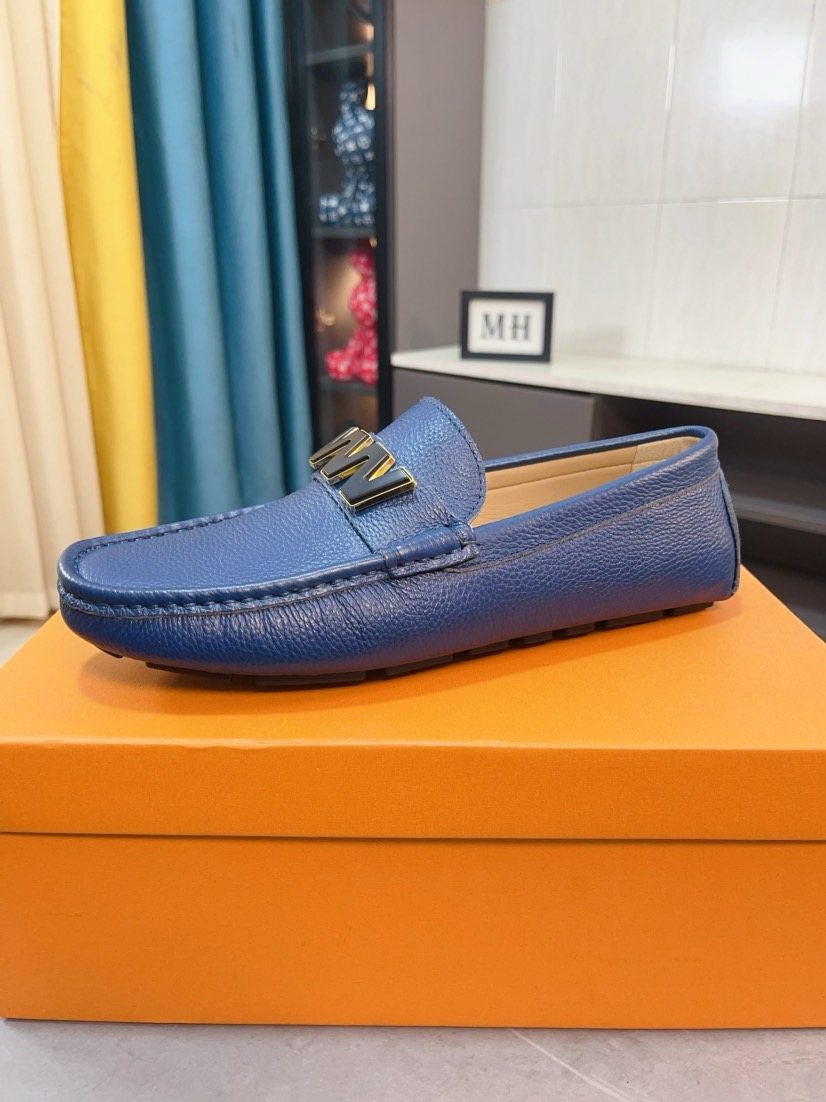 Louis Vuitton Blue Pebbled Driving Loafers — front