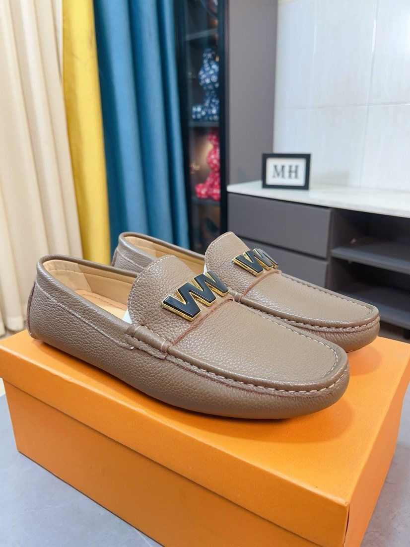 Louis Vuitton Blue Pebbled Driving Loafers — front