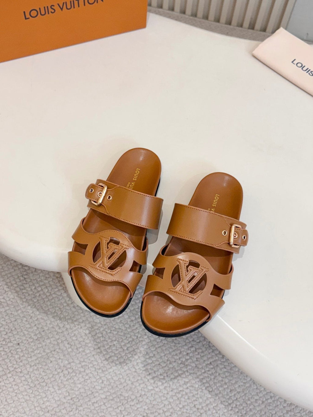 Louis Vuitton Cutout Buckle Slide Sandals — front