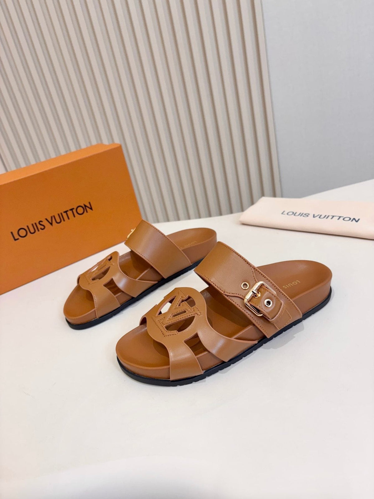 Louis Vuitton Cutout Buckle Slide Sandals — front