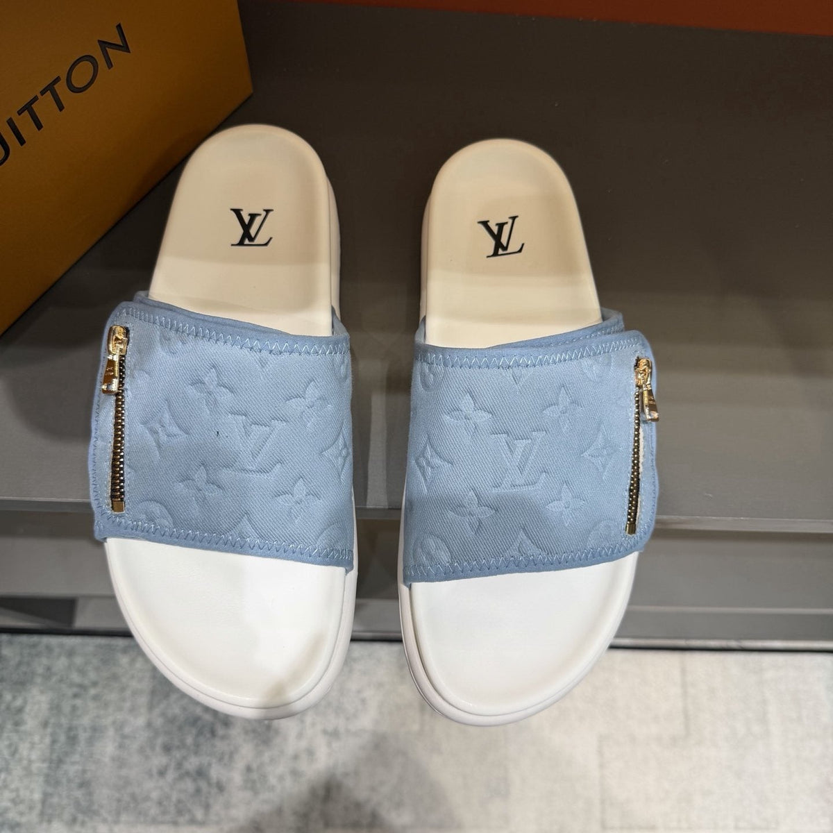 Louis Vuitton Embossed Zip Slide Sandals — front