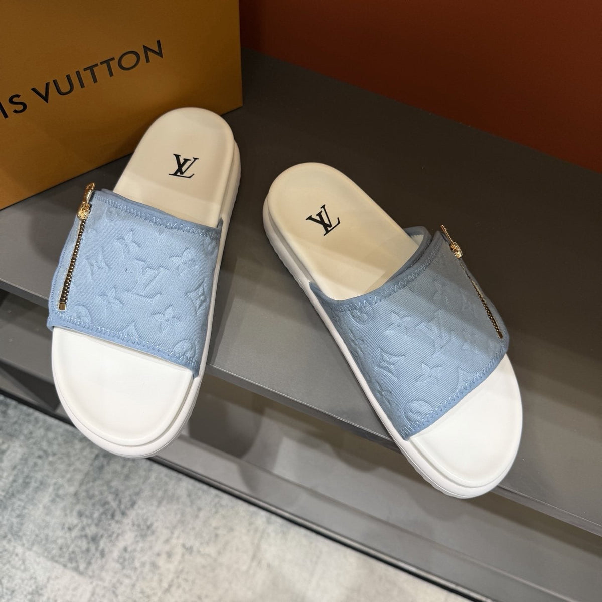 Louis Vuitton Embossed Zip Slide Sandals — front