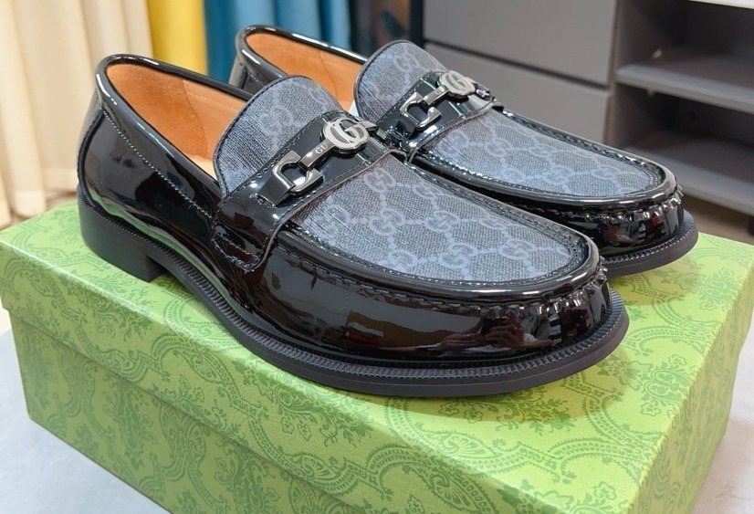Gucci Embossed Metal-Hardware Loafers — front