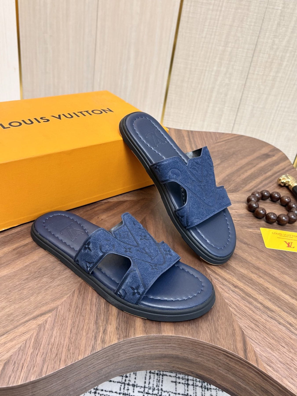 Louis Vuitton Embossed Navy Blue Slide Sandals — side