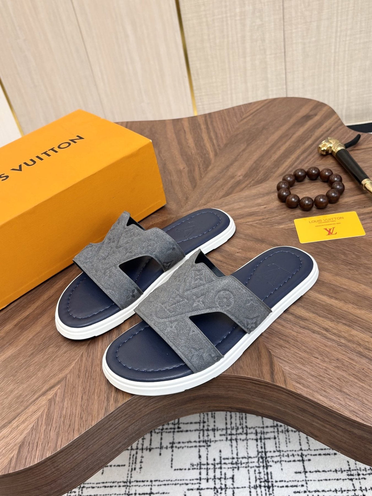 Louis Vuitton Embossed Navy Blue Slide Sandals — front