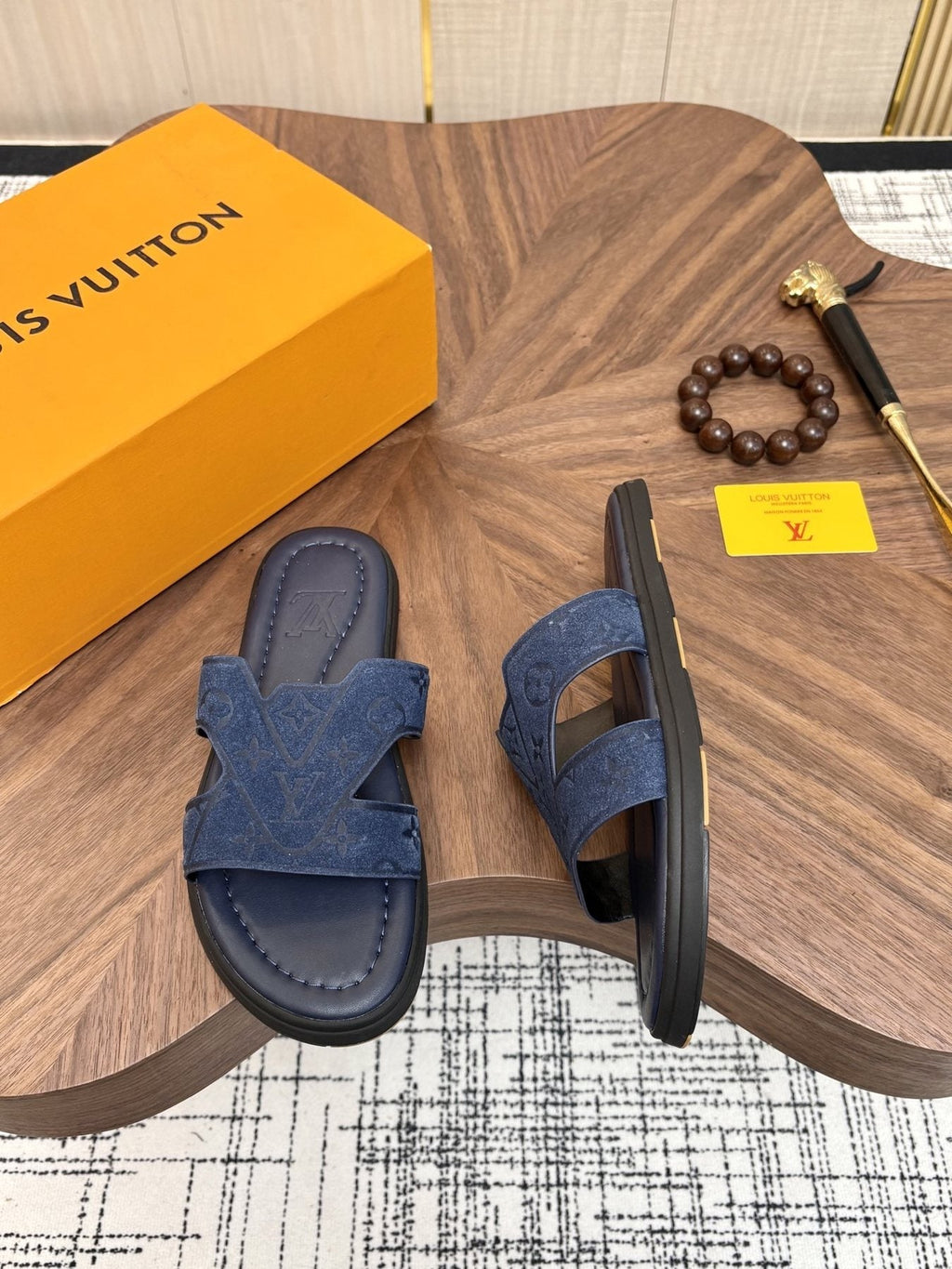 Louis Vuitton Embossed Navy Blue Slide Sandals — side