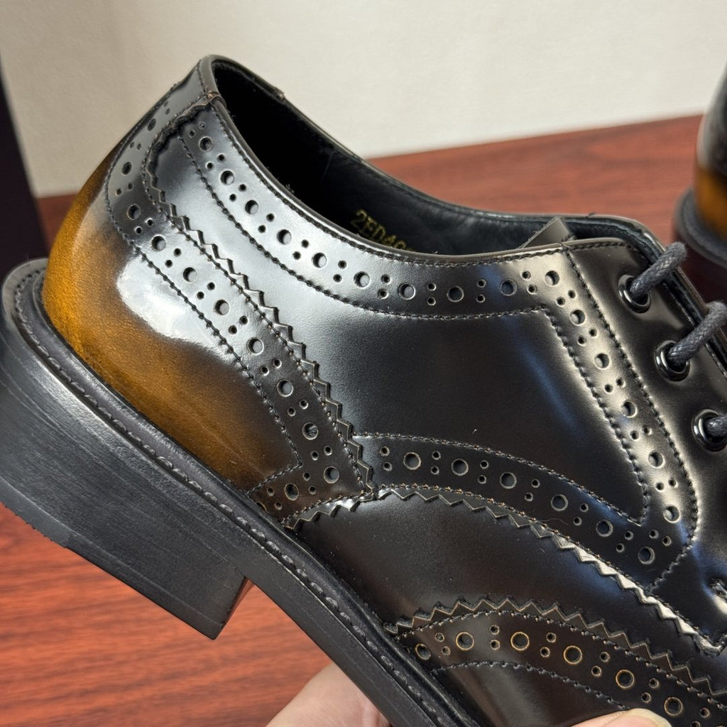 Prada Burnished Brogue Derby Shoes — detail