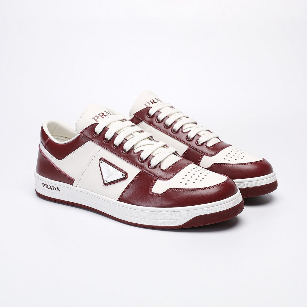 Prada Triangle Plaque Low-Top Sneakers — front