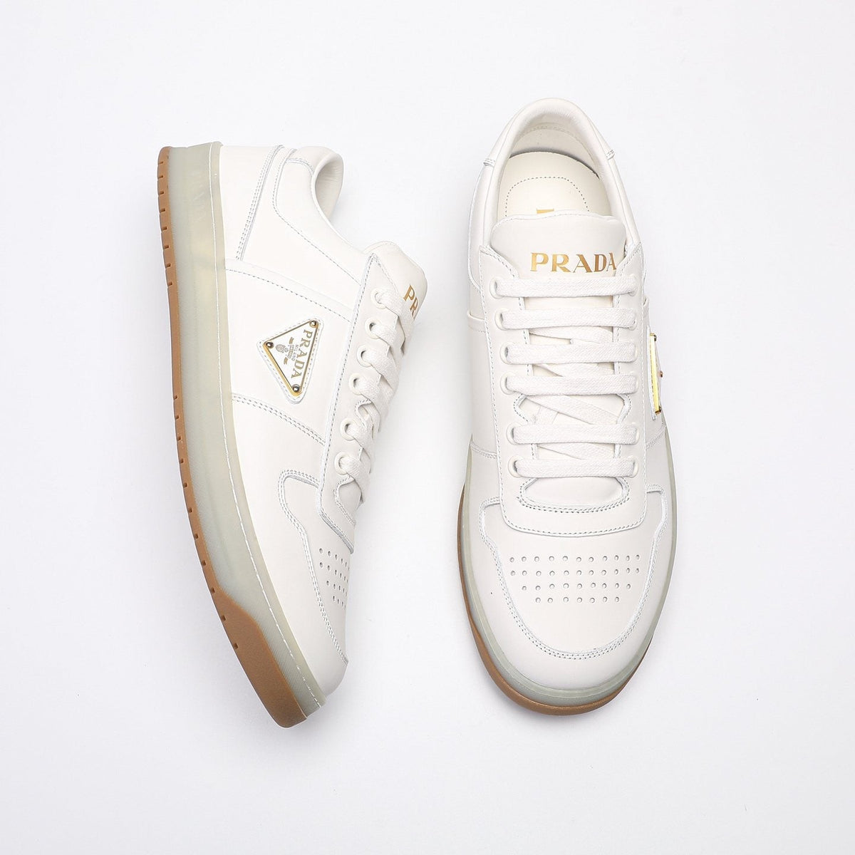 Prada Triangle Plaque Low-Top Sneakers — front