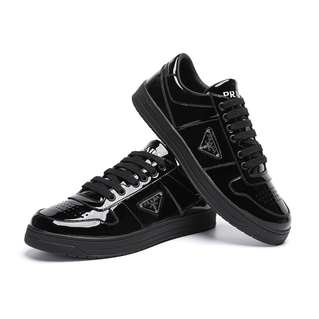 Prada Triangle Plaque Low-Top Sneakers — front