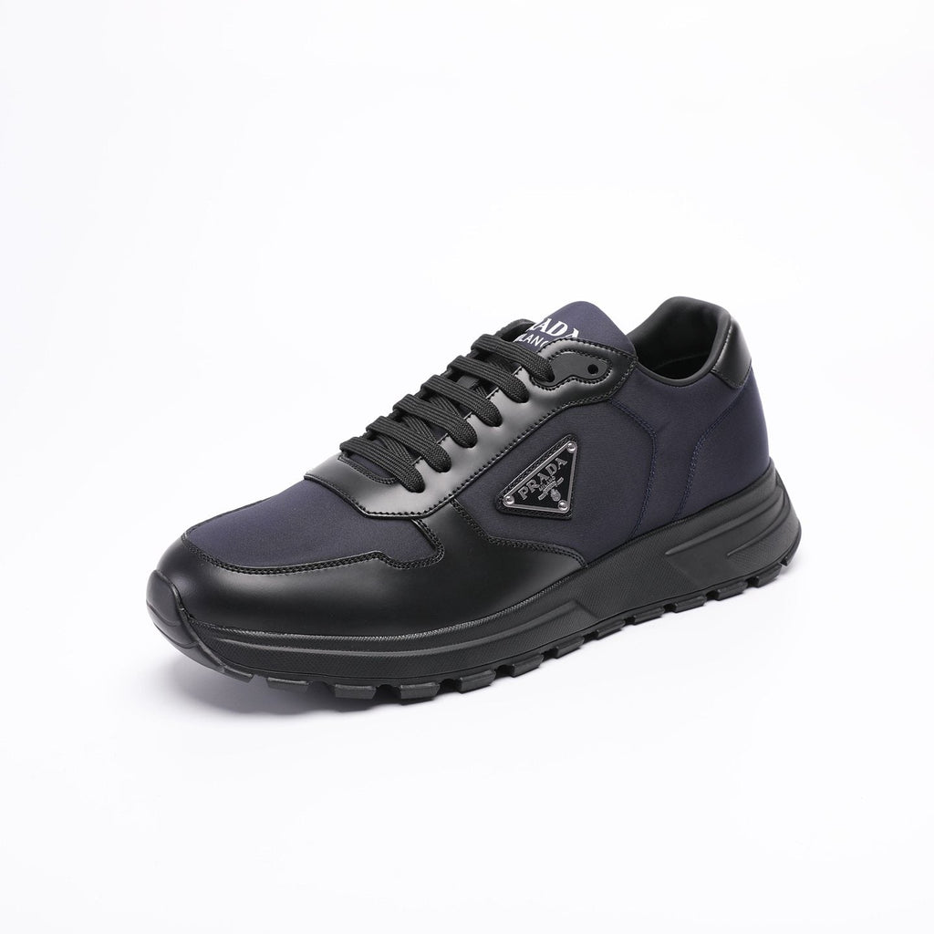 Prada Triangle Plaque Low-Top Sneakers — front
