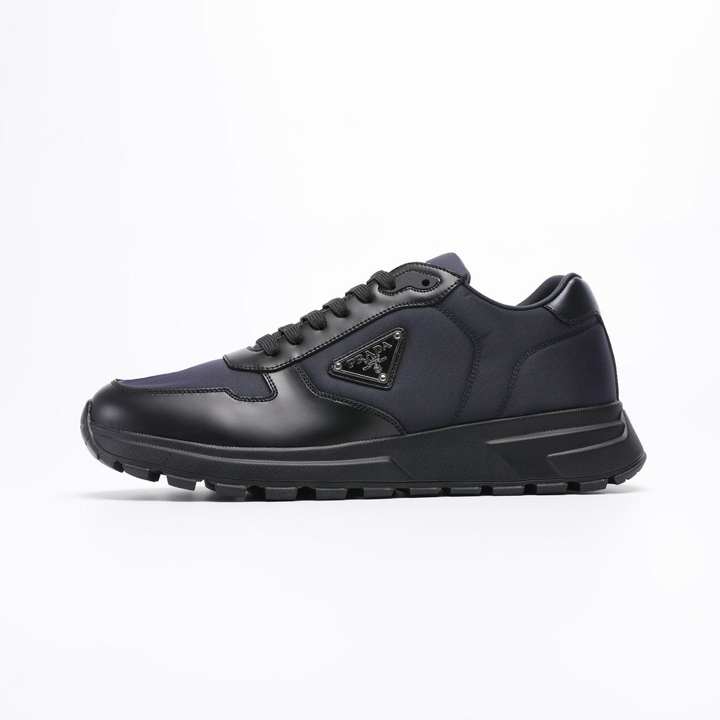 Prada Triangle Plaque Low-Top Sneakers — side