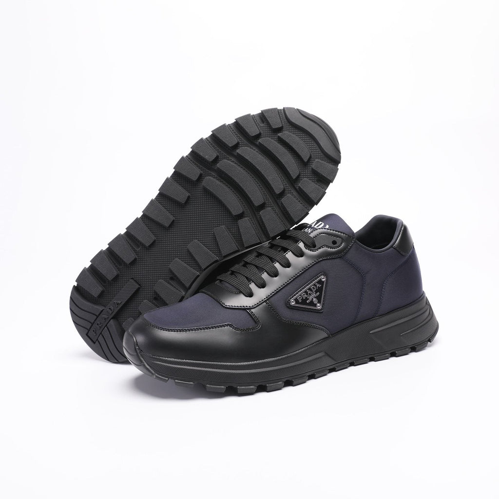 Prada Triangle Plaque Low-Top Sneakers — side