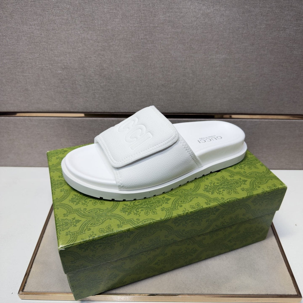 Gucci Raised Logo Slide Sandals — front