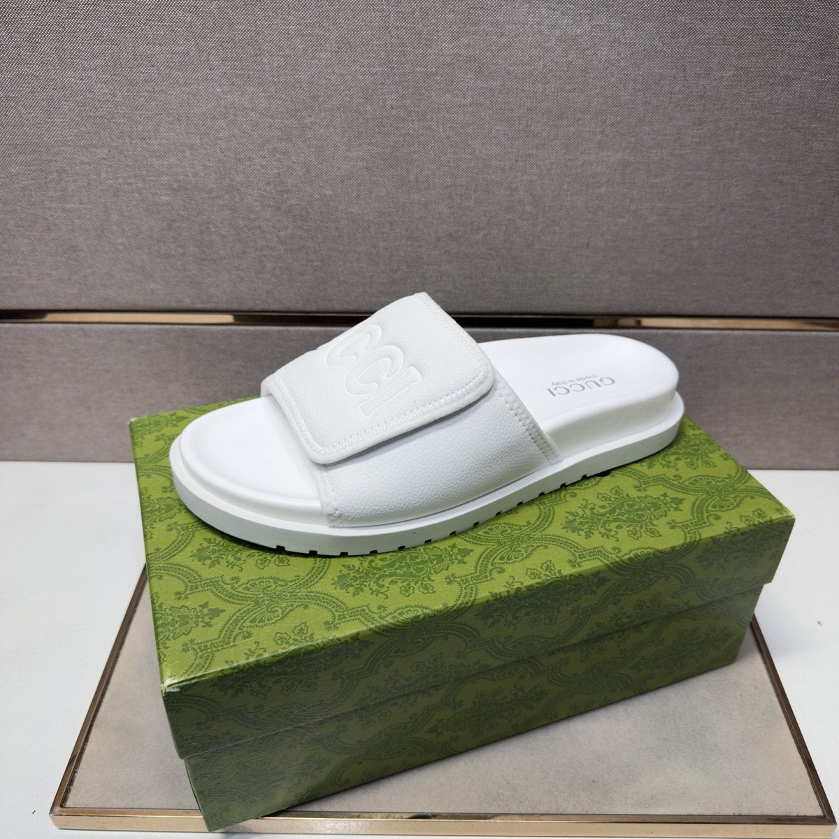 Gucci Raised Logo Slide Sandals — front