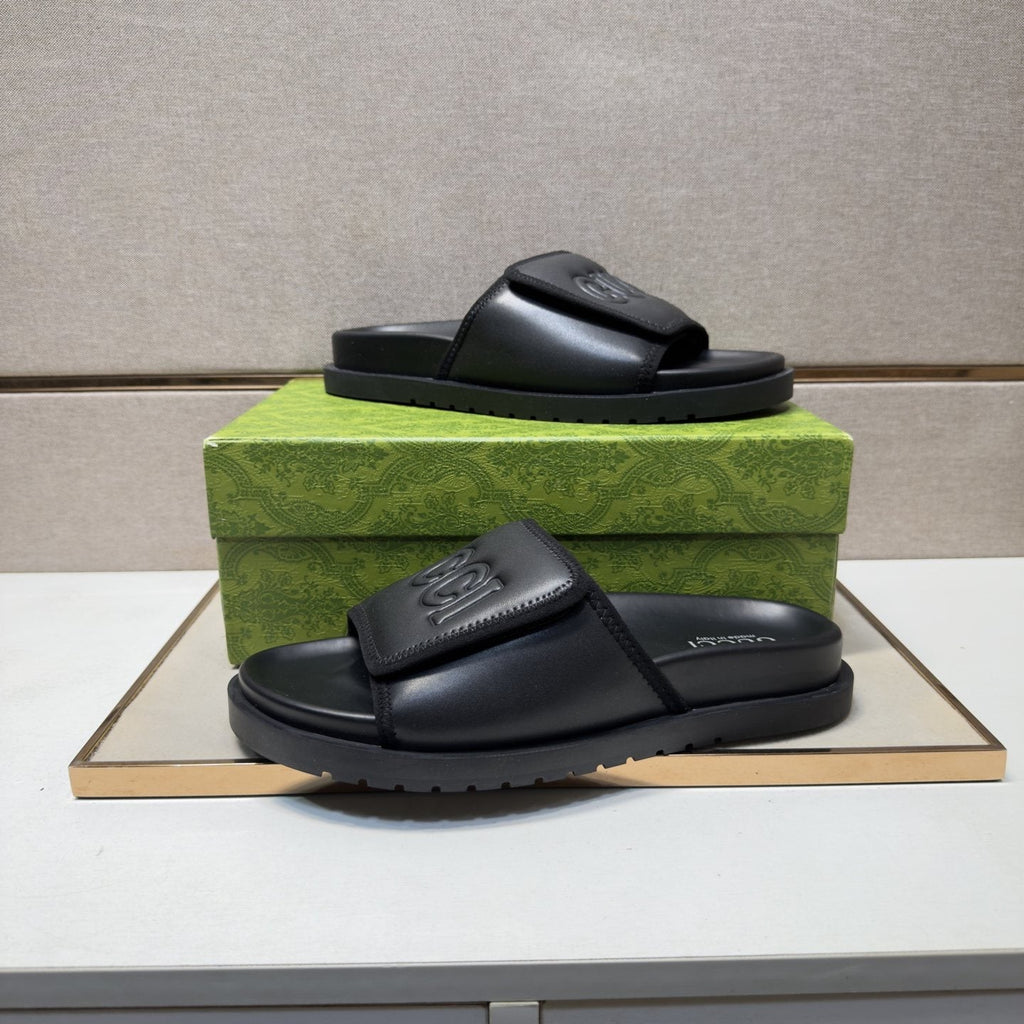 Gucci Raised Logo Slide Sandals — front