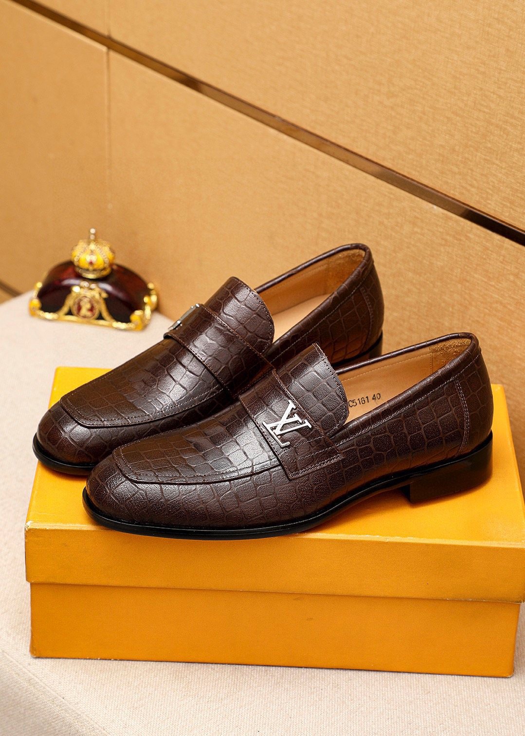 Louis Vuitton Embossed Metal-Accent Loafers — front