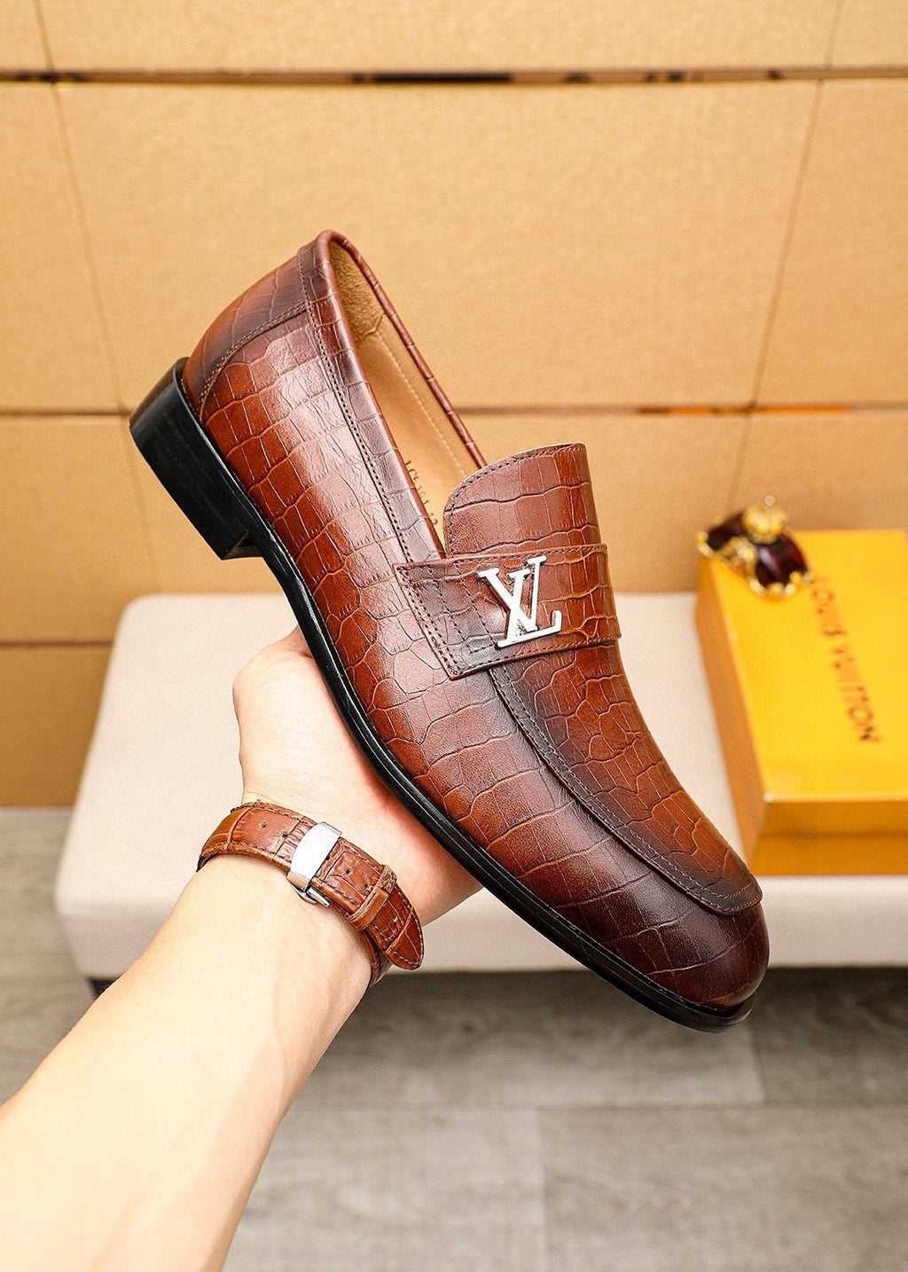 Louis Vuitton Embossed Metal-Accent Loafers — model