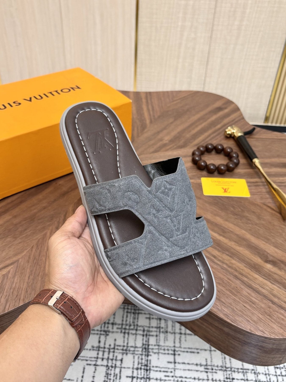 Louis Vuitton Monogram H-Cut Slide Sandals — model