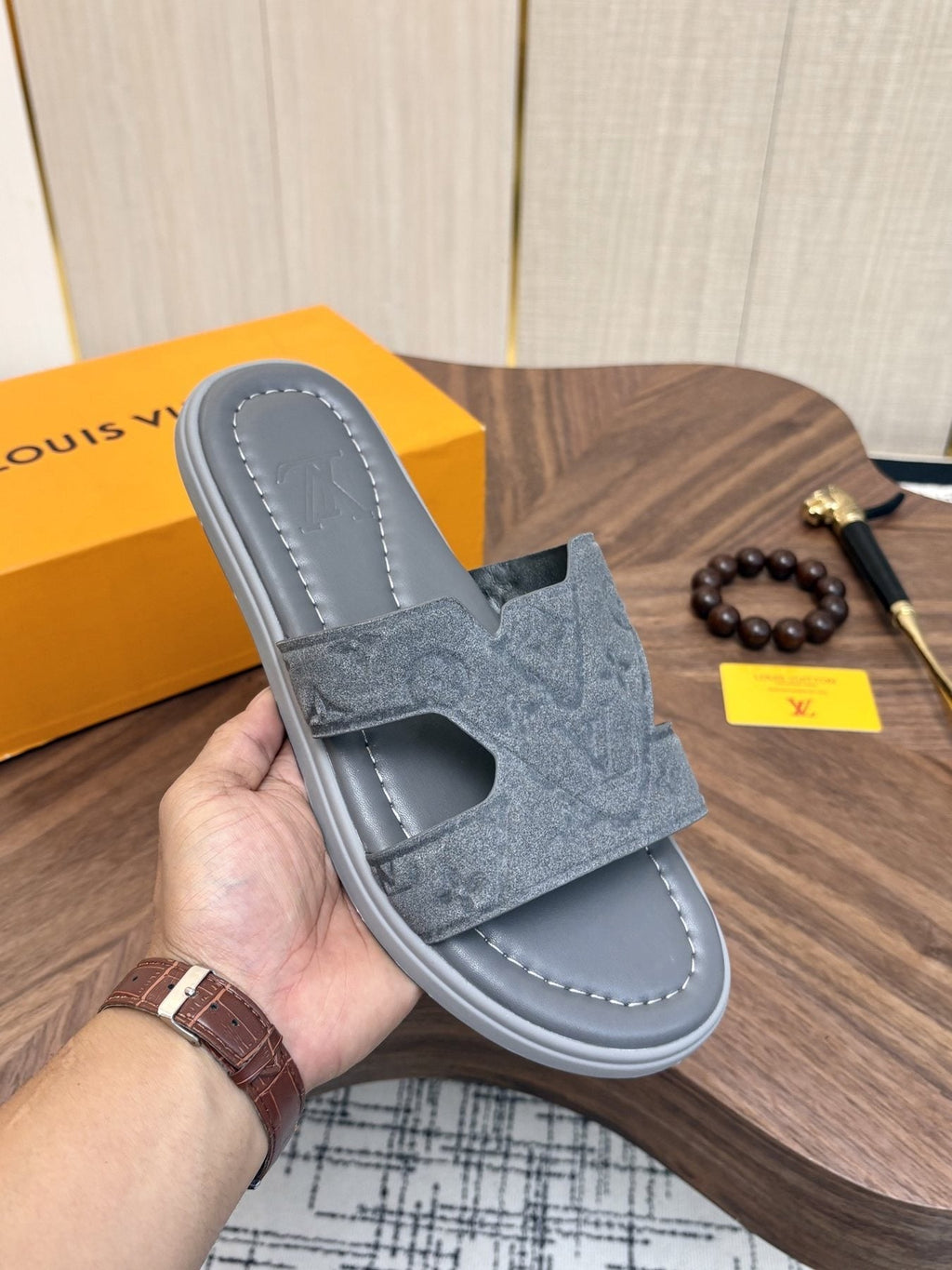 Louis Vuitton Monogram H-Cut Slide Sandals — model