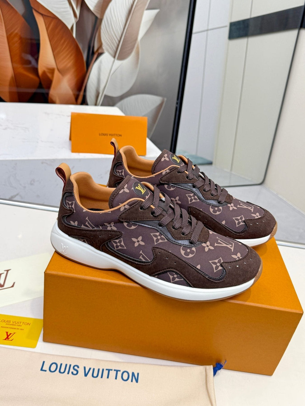 Louis Vuitton Cream Patterned Low-Top Sneakers — side