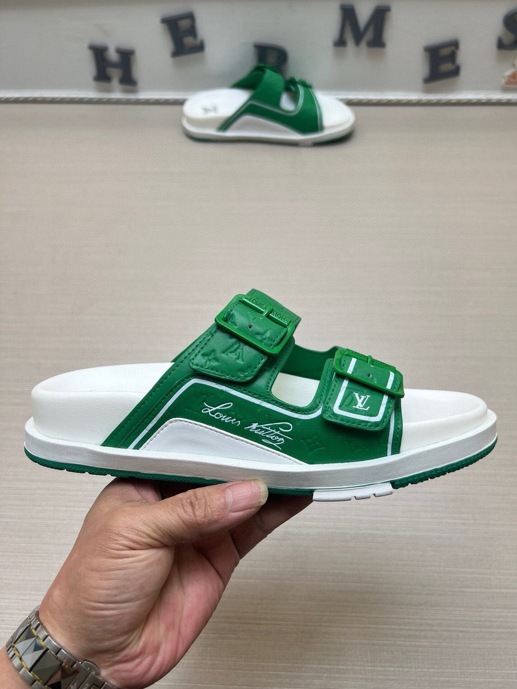 Louis Vuitton Double-Buckle Slide Sandals — model
