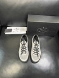 Prada White, Gray & Black Low-Top Sneakers — front
